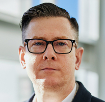 Alexander Hughes, PDG et dirigeant à la tête d'une société de trading crypto, portrait